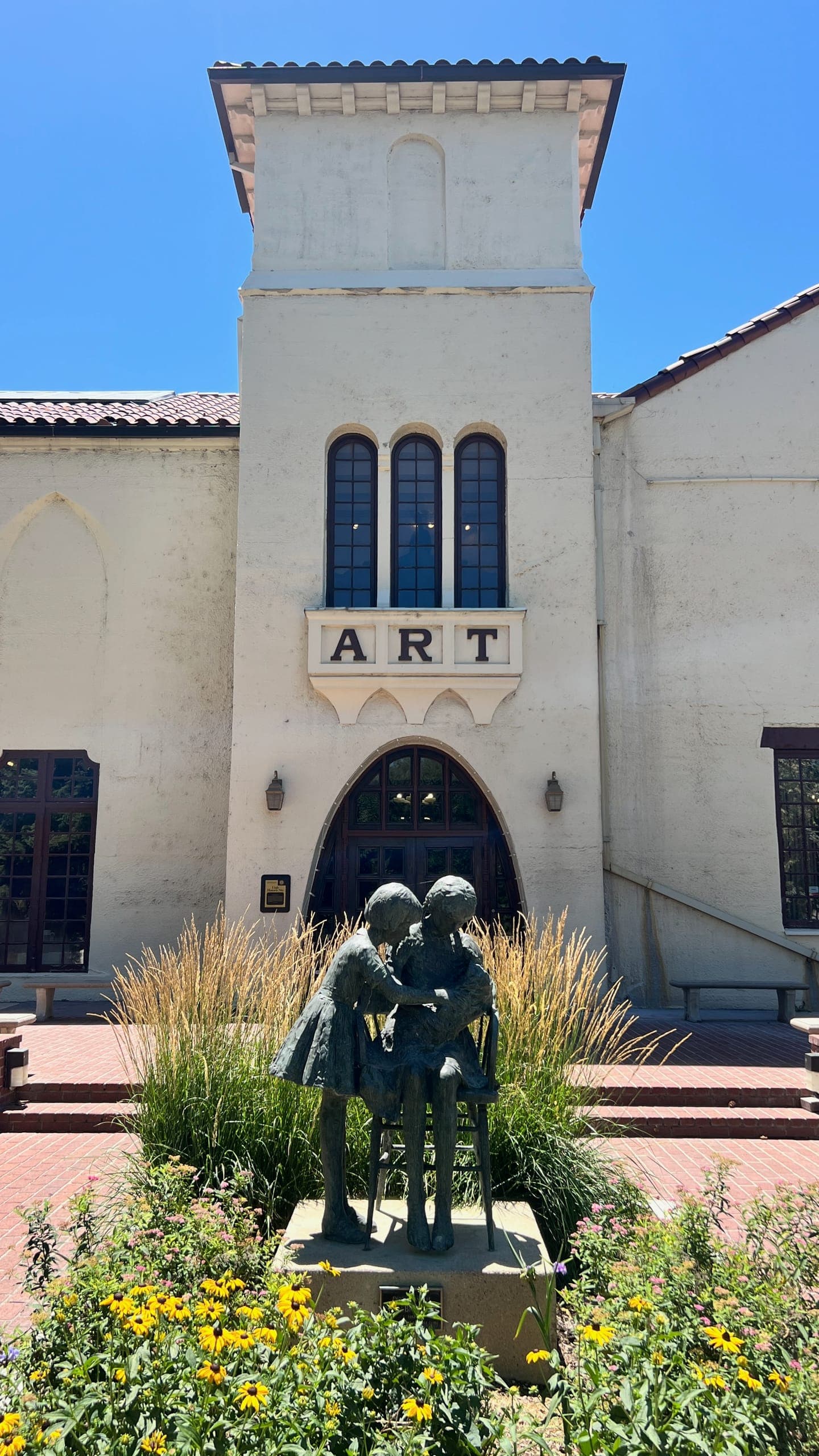 Exterior of the Springville Museum of Art with "ART" over the doorway.