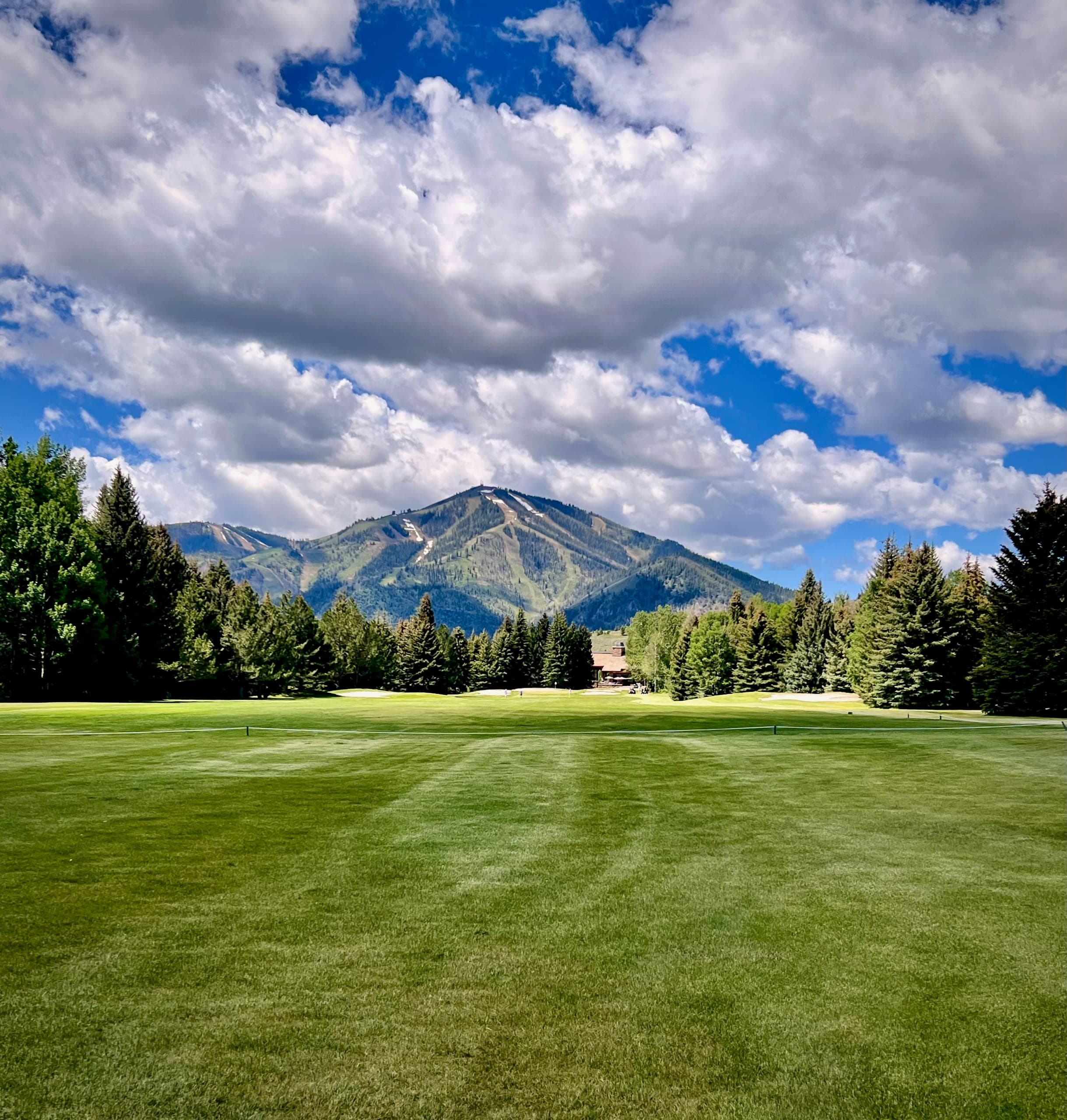 Golf fairway with Bald Mountain in the background.